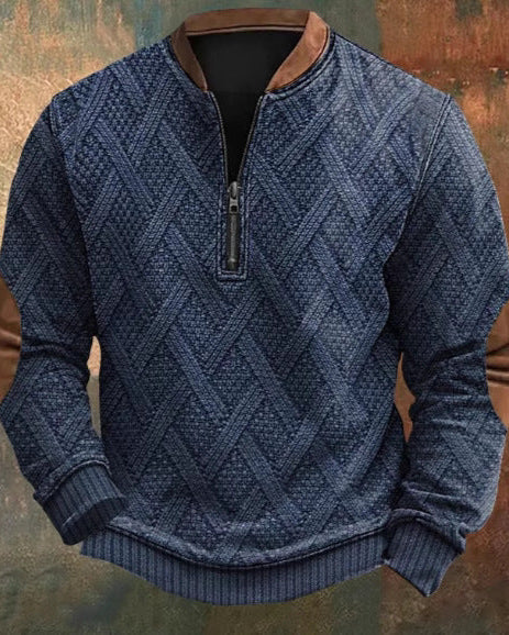 Maglione blu a trama intrecciata con zip corta, dettagli in pelle marrone su colletto e gomiti, stile casual elegante, moda uomo autunno inverno.
