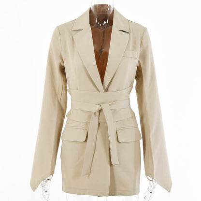 Women's autumn blazer with a belt and long bell sleeves.