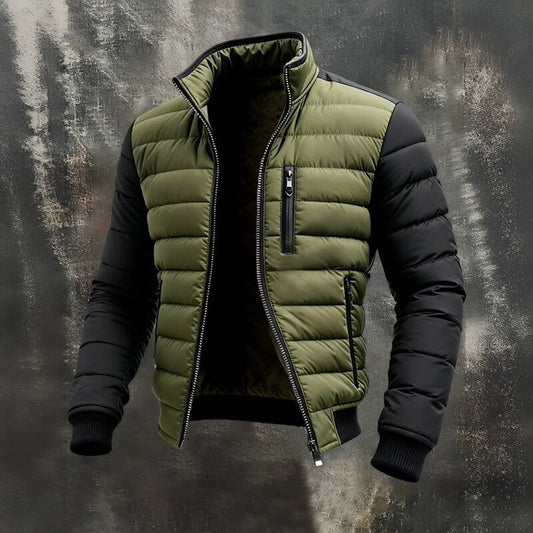 Men's quilted jacket for fall/winter with zipper, stand-up collar, and zippered pockets.