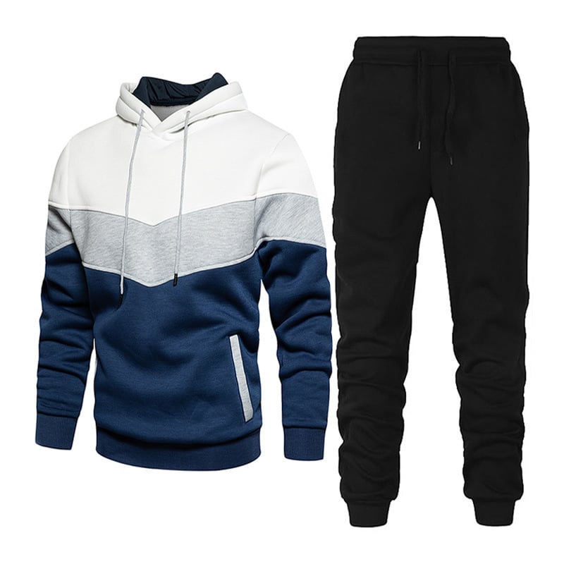 Tuta sportiva uomo, felpa con cappuccio tricolore blu, grigio e bianco, pantaloni neri. Abbigliamento casual, moda uomo, comfort quotidiano.