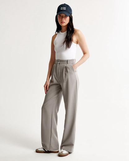 Pantaloni donna a vita alta con gamba ampia e tasche laterali