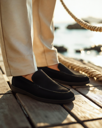 Men’s suede loafers with contrasting black soles and a slip-on design