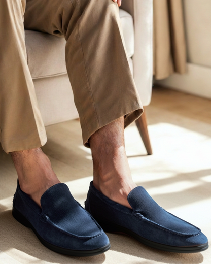Men’s suede loafers with contrasting black soles and a slip-on design