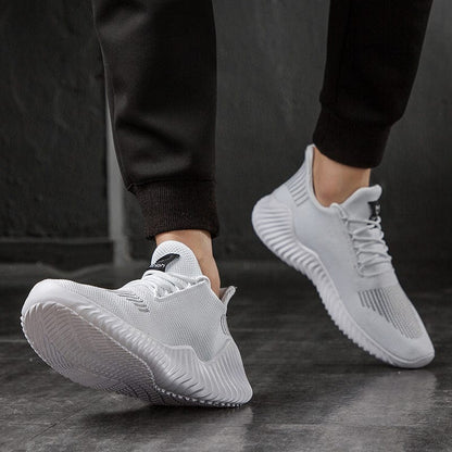 Sneakers da Uomo Senza Lacci con Tomaia in Mesh e Sistema a Canale d’Aria – Suola Leggera
