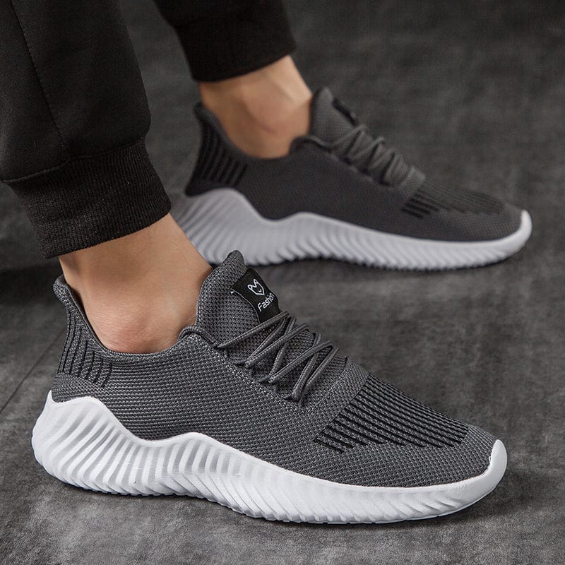 Sneakers da Uomo Senza Lacci con Tomaia in Mesh e Sistema a Canale d’Aria – Suola Leggera