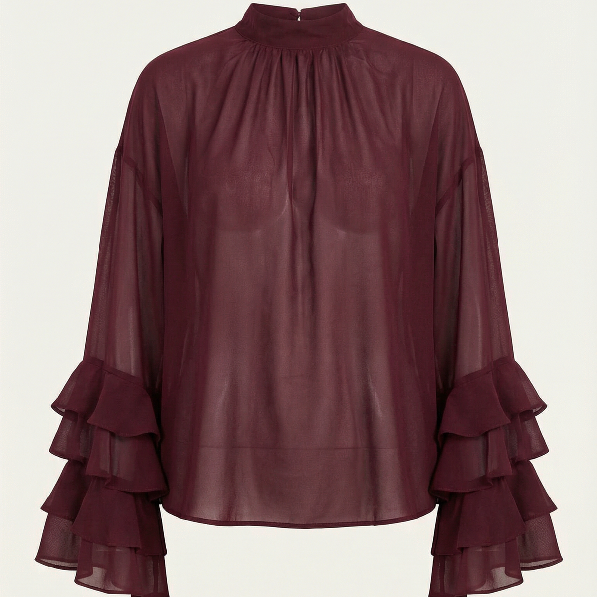 Blusa de mujer color burdeos de gasa transparente con mangas con volantes y cuello alto.