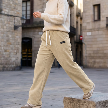 Women's Wide-Leg Corduroy Pants with an Elastic Waist, Drawstring, and Side Pockets.