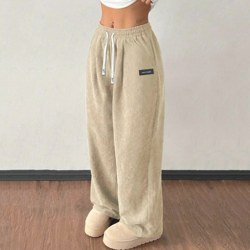 Women's Wide-Leg Corduroy Pants with an Elastic Waist, Drawstring, and Side Pockets.
