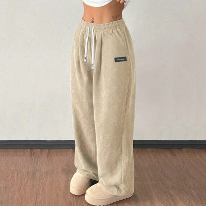 Women's Wide-Leg Corduroy Pants with an Elastic Waist, Drawstring, and Side Pockets.