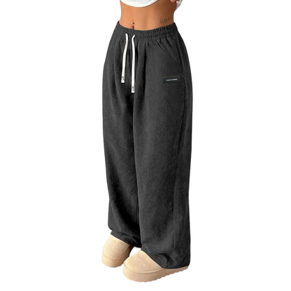 Women's Wide-Leg Corduroy Pants with an Elastic Waist, Drawstring, and Side Pockets.