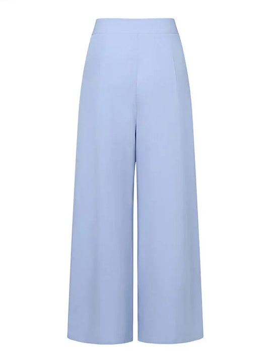 Pantaloni palazzo donna azzurri, vita alta, eleganti, tessuto leggero. Ideali per look estivi e formali. Moda femminile, abbigliamento trendy.